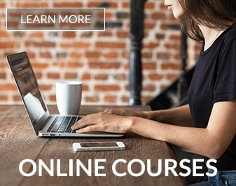 image of a woman working on a laptop